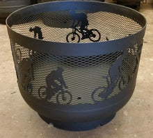 Charger l'image dans la galerie, Standard Size Carved Fire Pit - Cyclists - Muskoka Fire Pits
